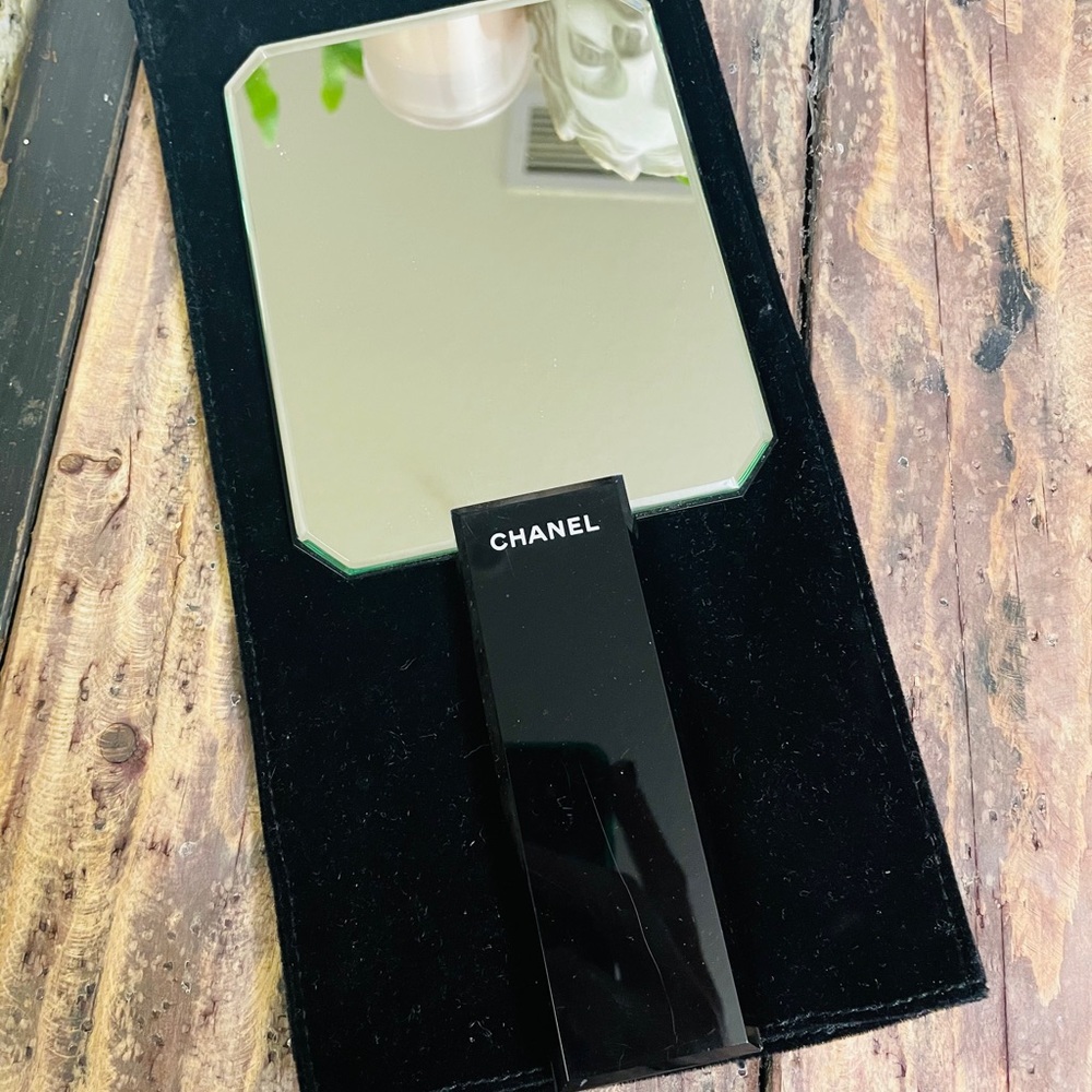 Chanel hand held mirror.